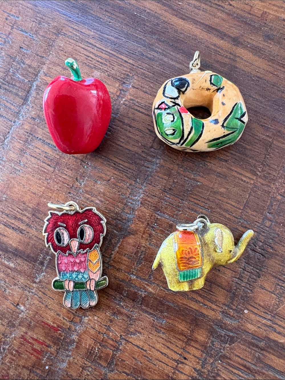 3 charms and a pin from the 80s